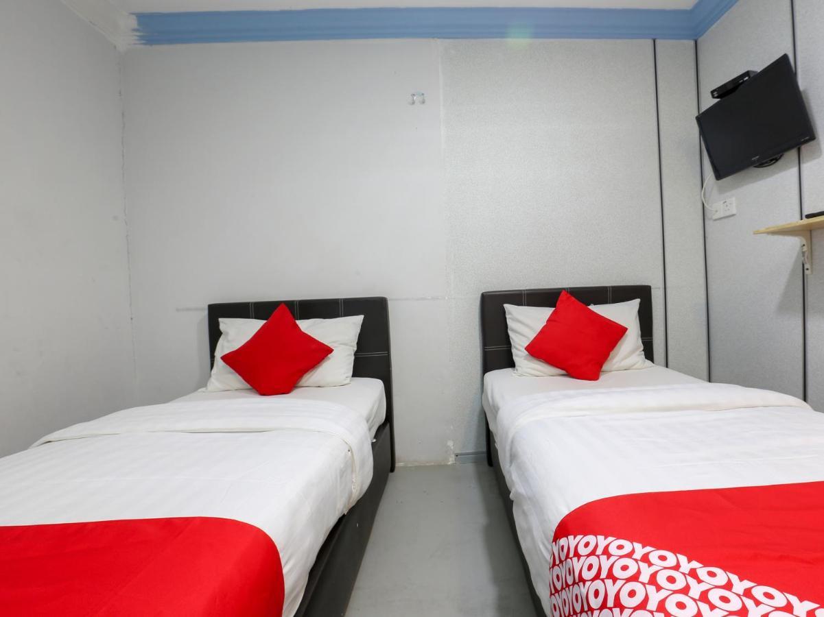Oyo 90126 Pen U Cottages Dungun Buitenkant foto