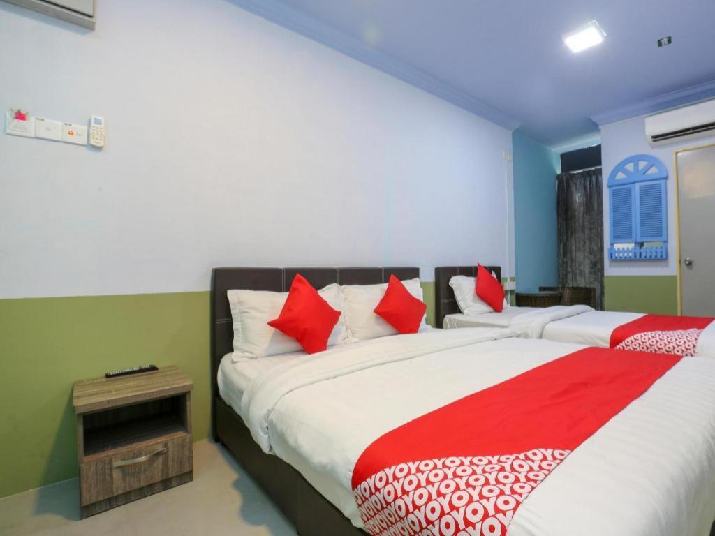 Oyo 90126 Pen U Cottages Dungun Buitenkant foto